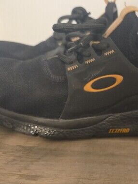Oakley Black Sneakers with Orange Accents